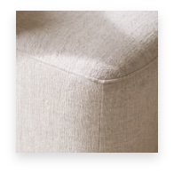 Cream boucle upholstery at a seam